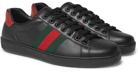 black Gucci trainers for men